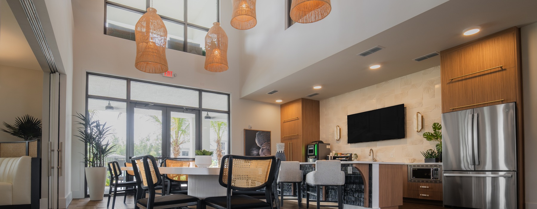 community clubhouse with large open kitchen and vaulted ceilings