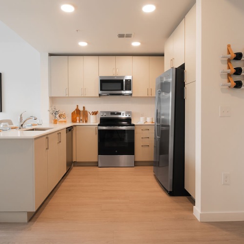 kitchen with open countertop facing living room