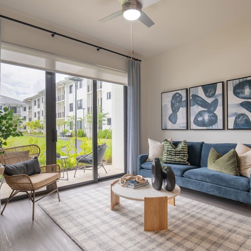 ceiling fan and light fixture in large living room