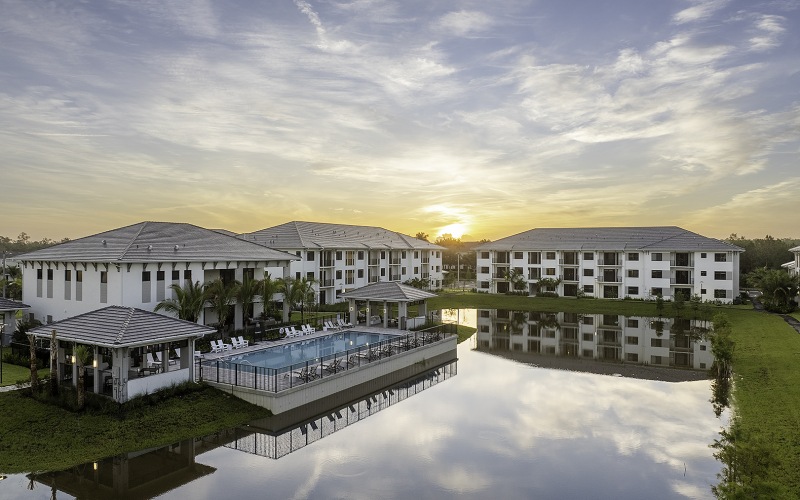 building exteriors next to lake
