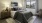 spacious bedroom on wood-style flooring