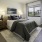 spacious bedroom on wood-style flooring
